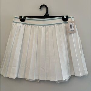 Peter Millar Mickey pleated skort in white with a light blue waistband trim